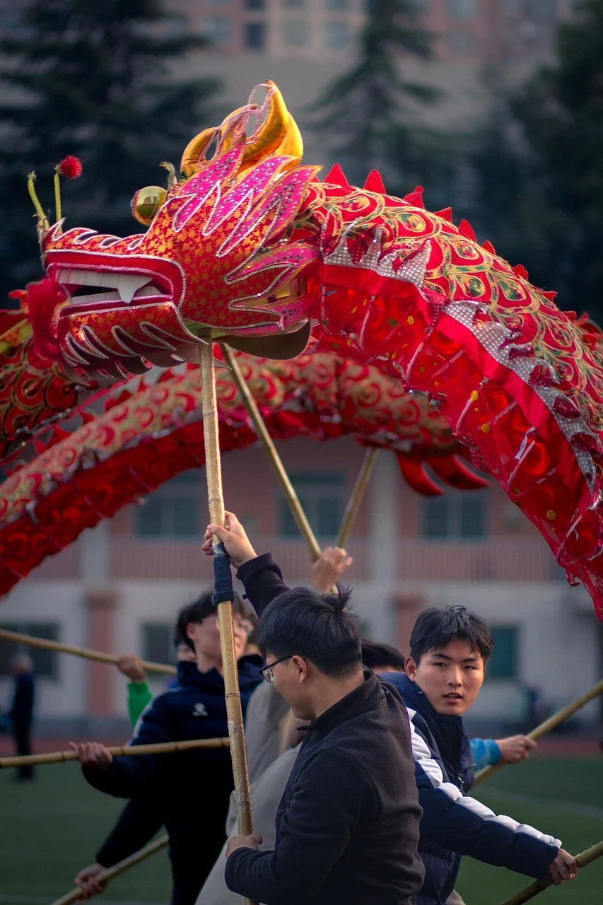 Chinese dragon dance red satin fabric dragon performers festival celebration